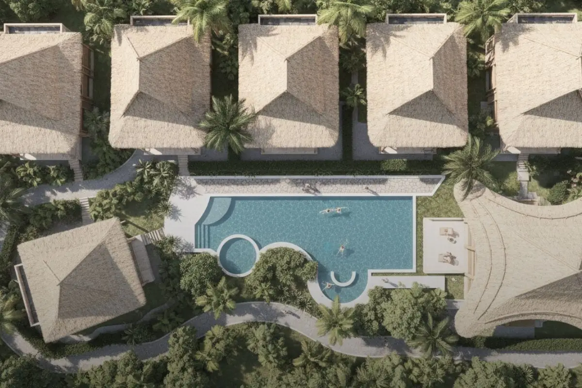 Aerial view of boutique resort villas arranged around a central pool illustrating small resort design and human-scale hospitality planning.