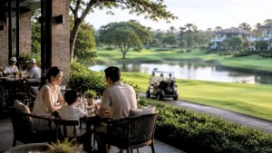 Family dining at a golf estate overlooking golfers and a residential community in the Philippines